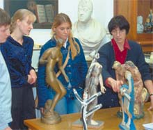 Museum Studies Students with Moira Vincentelli and Ceramic Figures.